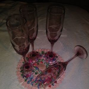 Set of four pink / purple champagne flutes
